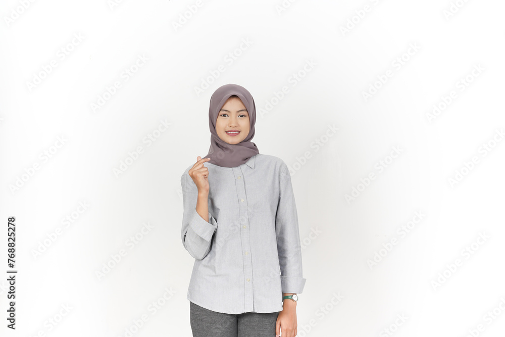 Young Asian woman wearing hijab showing love finger korean isolated on white background Young Asian woman wearing hijab showing love finger korean isolated on white background