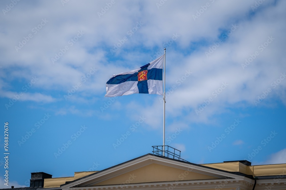 Finnish flag above Helsinki University in Finland