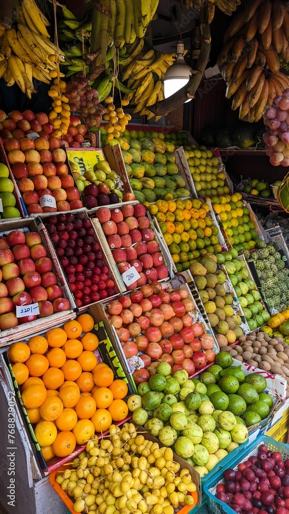 Vibrant selection of fresh fruit on display at a market stand