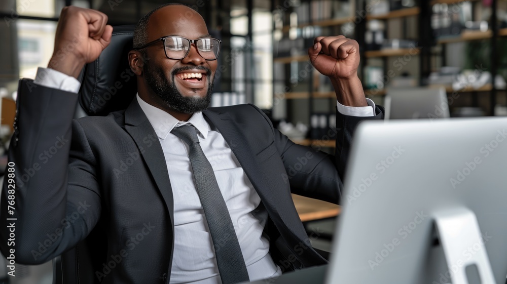 Successful Businessman Celebrating Victory at Work Successful Businessman Celebrating Victory at Work