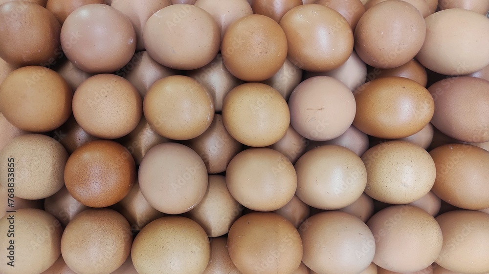 Pile of egg on the eggs cartoon in displayed in supermarket to attract the buyer Pile of egg on the eggs cartoon in displayed in supermarket to attract the buyer