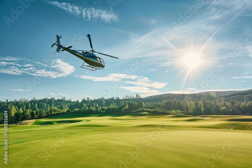 A modern helicopter flying above a beautiful golf course