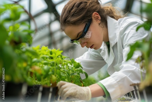 An intrigued researcher analyzing plant growth in a greenhouse photo