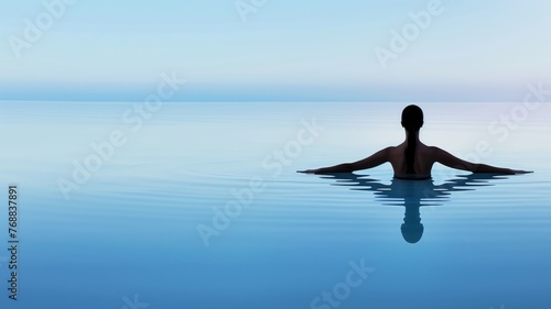 Wallpaper Mural Tranquil person meditating in still water at dusk Torontodigital.ca