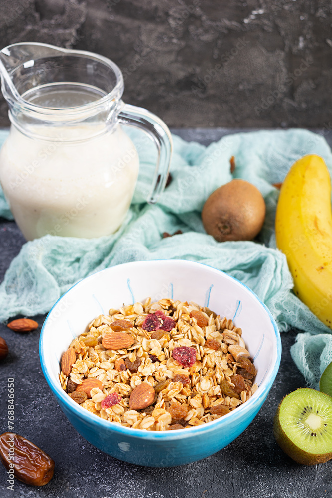 Bowl of granola with nuts, berries and yogurt. Muesli oats with fruits Bowl of granola with nuts, berries and yogurt. Muesli oats with fruits