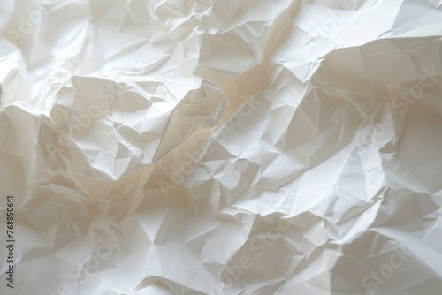Crumpled white paper texture photo