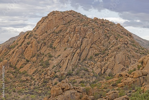 Panoramic picture of Damaraland in Namibia under a cloudy sky during the day
