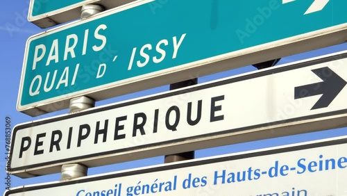 Peripherique and Paris road signs in Issy-les-Moulineaux, France