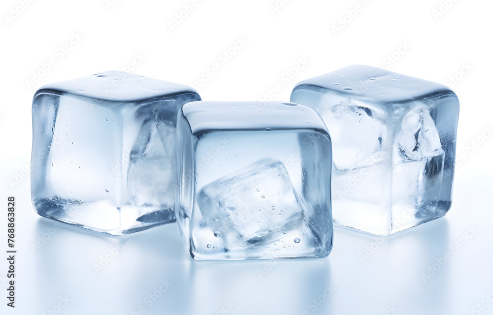 Obraz premium Three melting ice cubes on white background