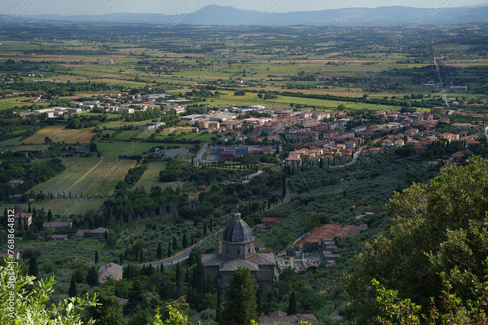 Panoramic view from Cortona, Italy, at summer. Santa Maria delle Grazie al Calcinaio