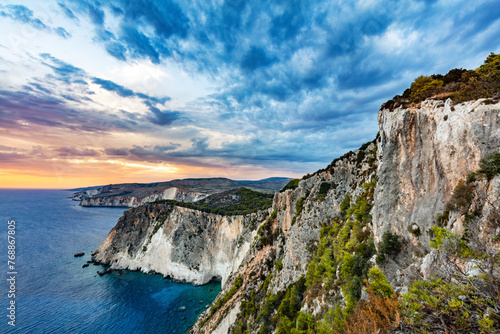 Zakynthos in Greece, Keri cliffs and Ionian sea at sunset