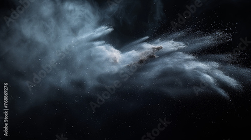 Natural dust particles flow in air on black background.
