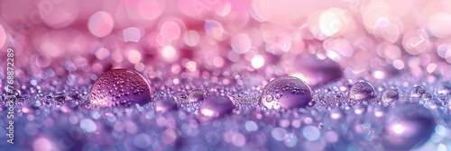 A shimmering abstract water background with glittering bokeh lights glowing in vibrant shades of pink and gold, perfect for holiday celebrations.