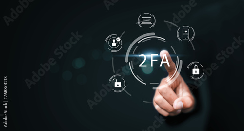 2 factor authentication 2FA method using portable computer devices to protect data and account on internet data security concept, businessman hand and computer technology graphics icon.