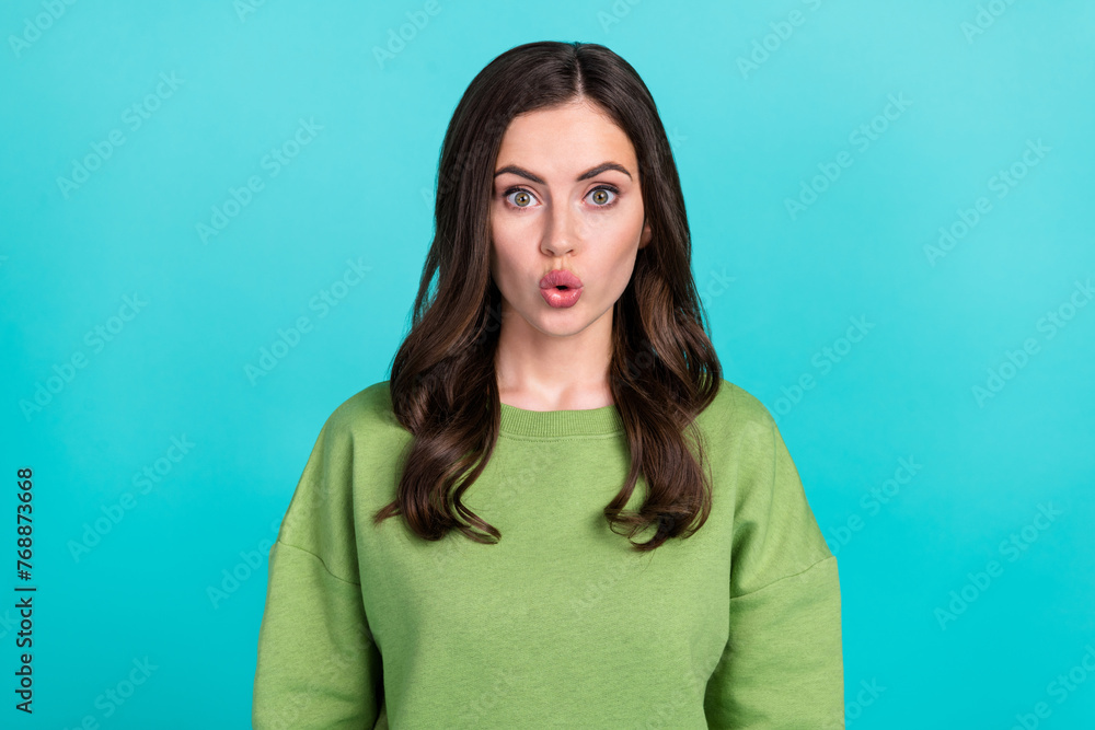 Portrait of astonished young lady pouted lips look camera cant believe isolated on teal color background - obrazy, fototapety, plakaty 