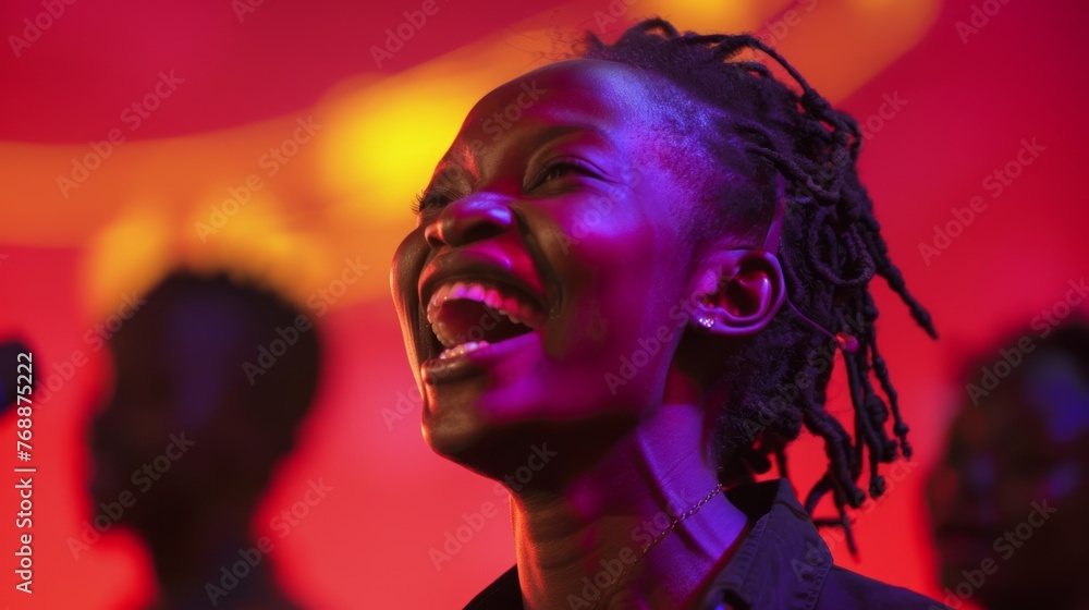 A close-up shot of a contestant's face beaming with joy as their name is announced as the winner A close-up shot of a contestant's face beaming with joy as their name is announced as the winner