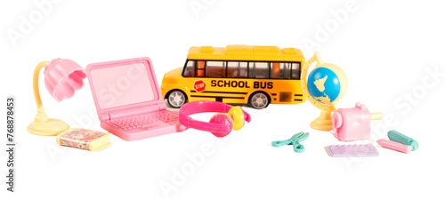 A toy set of school supplies and a toy school bus