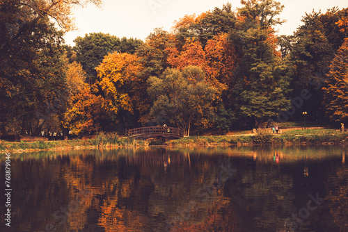 Autumn colourful park with a lake 