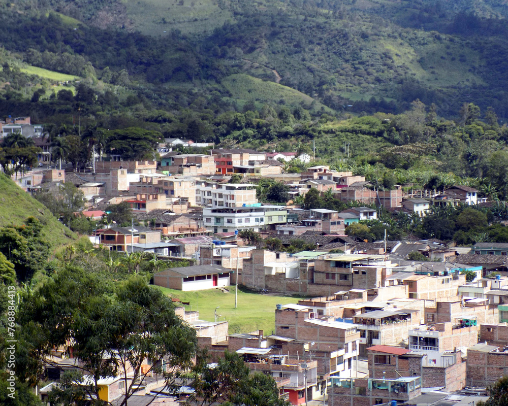 landscape of towns with roads, gardens, houses, courts, and tropical vegetation