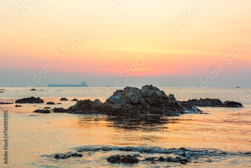 Sunrise scenery of the winter sea. Winter morning scenery of Gangyang Port in Ulsan City, North Gyeongsang Province. photo