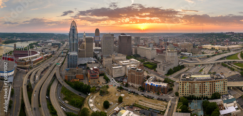 Cincinnati, Ohio. USA transportation infrastructure concept. Above view of wide highway crossroads at night with fast driving cars