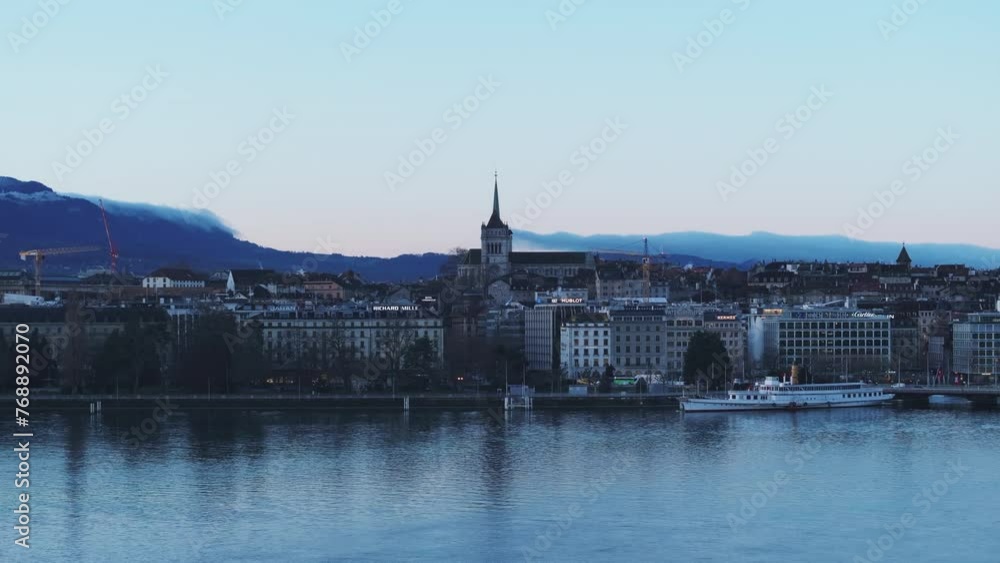 Morning shot of historic urban borough with famous St Pierre Cathedral. Geneva lake in foreground. Geneva, Switzerland Morning shot of historic urban borough with famous St Pierre Cathedral. Geneva lake in foreground. Geneva, Switzerland