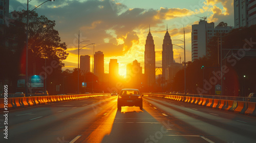 Sunset Streetscape: Driving into the Orange Horizon © Andrii 