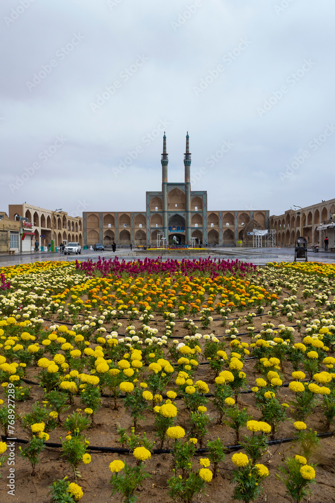 The Amir Chaghmagh mosque and plaza in Yazd, Iran on a rainy day.