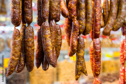 Chinese Preserved Sausages hanging in grocery store
