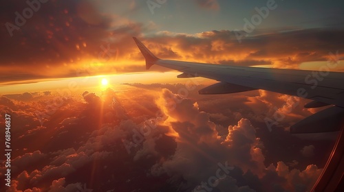 Spectacular sunset sky and aircraft wing captured through airplane window, inspiring travel and adventure vibes, awe-inspiring nature view
