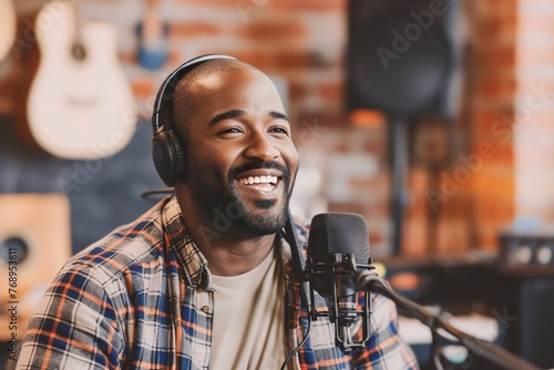 African man recording sound with microphone doing podcast or broadcasting on radio