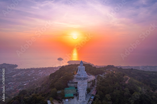 Statue big Buddha in Phuket on sunset sky, aerial top view. Concept travel Thailand landmark