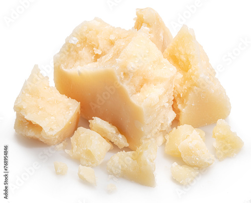 Parmesan cheese pieces isolated on white background.
