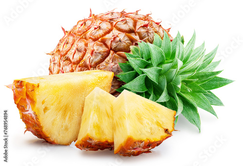 Ripe pineapple and pineapple slices isolated on white background. File contains clipping path. photo