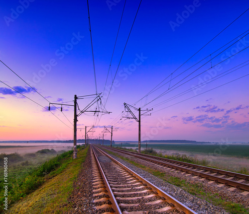 Dawn's Awakening: A Serene Journey Along the Railway Tracks