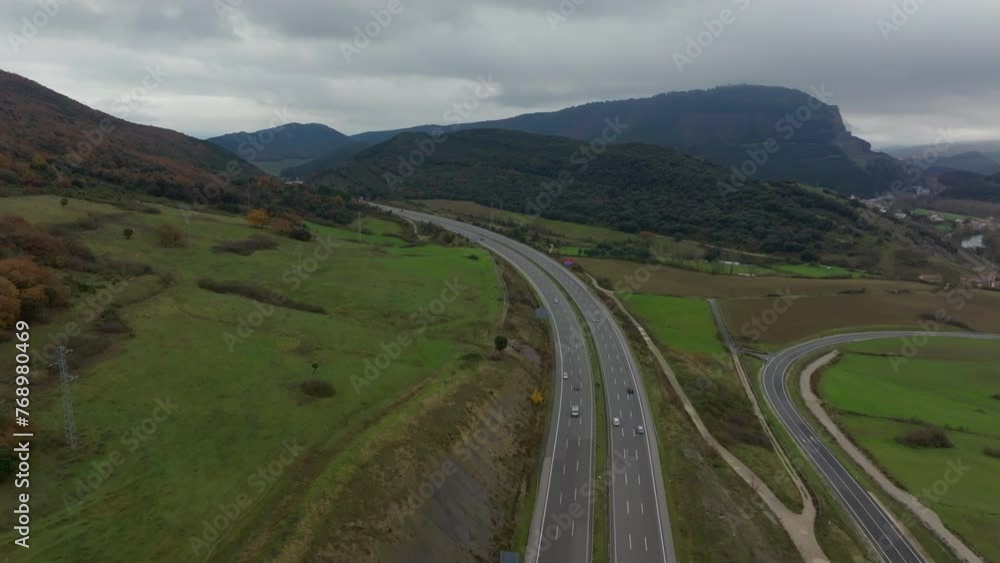The drone flies forward, capturing the road, the hills of the Basque Country in Spain The drone flies forward, capturing the road, the hills of the Basque Country in Spain