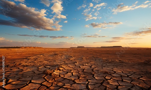 Sun Setting Over Barren Fields