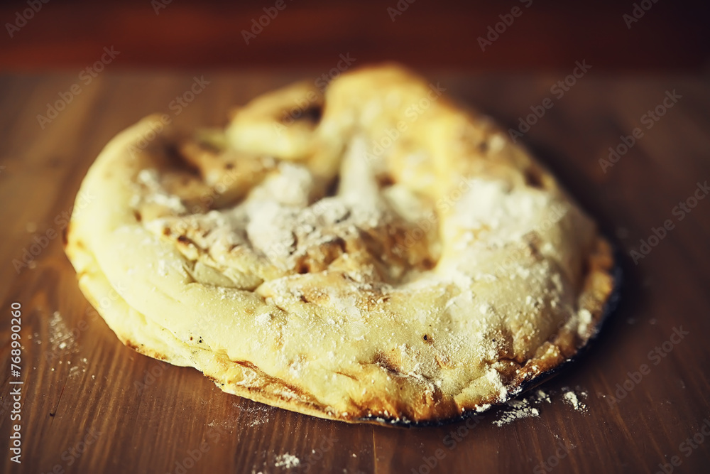 Lavash from whole grain durum flour. Handmade fresh pastries. Flour product. Bread, flour and ingredients. Lavash from whole grain durum flour. Handmade fresh pastries. Flour product. Bread, flour and ingredients.