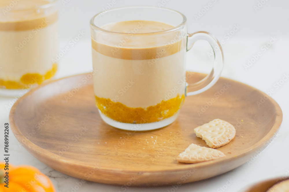 Pumpkin Latte on white background. Autumn concept. Pumpkin Latte on white background. Autumn concept.