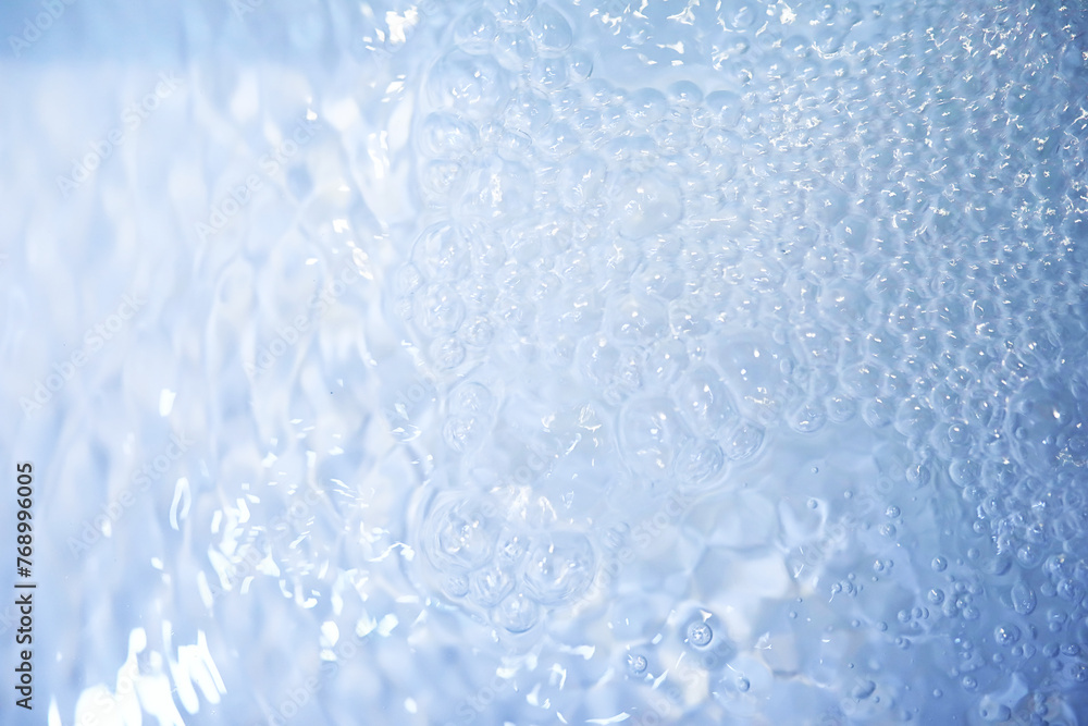 Blue water texture. Bubbles and bubbling water. Blue water texture. Bubbles and bubbling water.