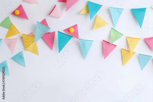 Colorful paper bunting banner with colorful triangular flags on white background. AI Generated