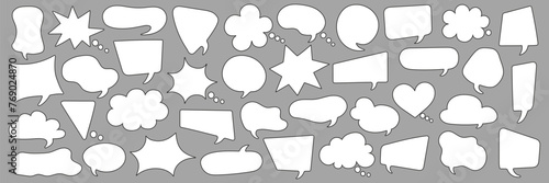Set of comic speech bubbles. White dialog bubbles on gray background. Comic speech explosions. Editable stroke