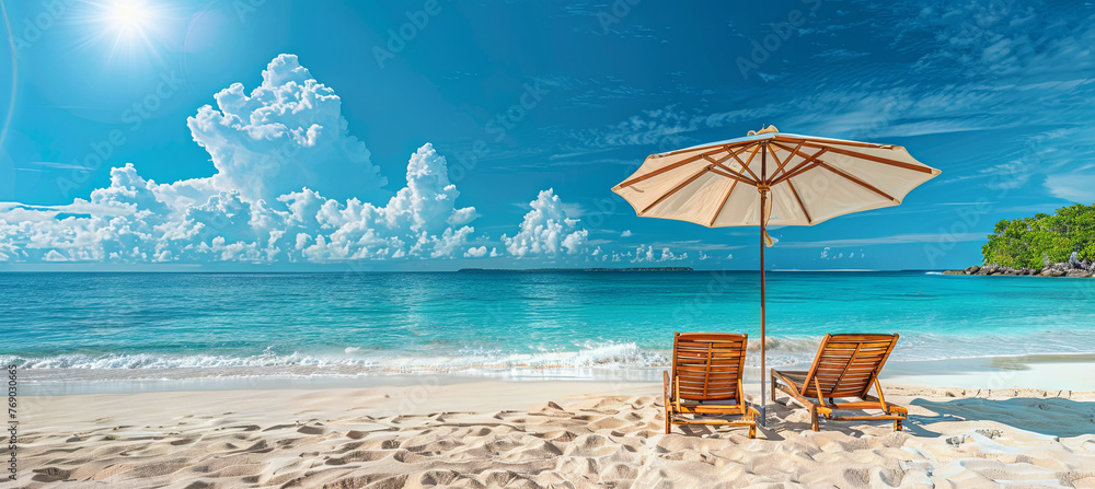 Beach chairs and umbrella on the tropical beach background, travel concept 