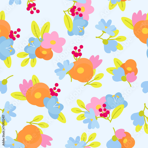 Delicate spring flowers in a seamless pattern on a blue background