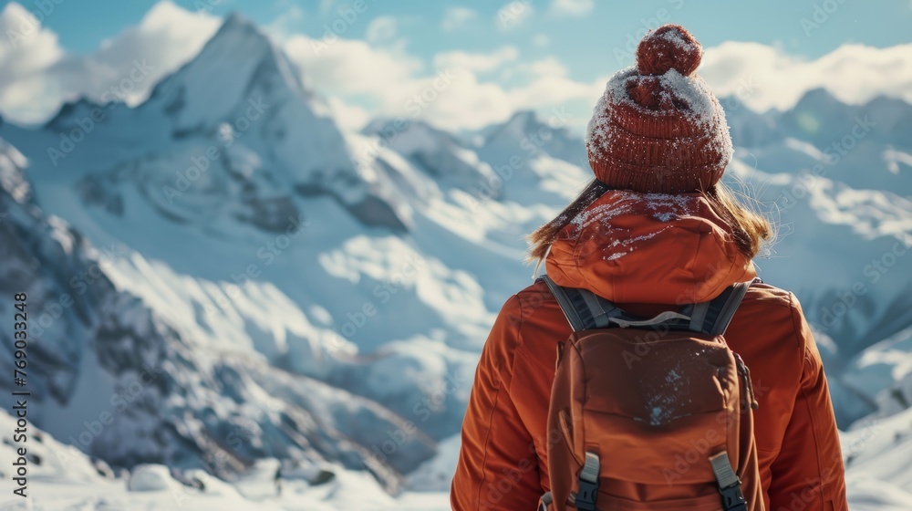 Woman at Ski Resort with Snowy Mountain Backdrop Woman at Ski Resort with Snowy Mountain Backdrop
