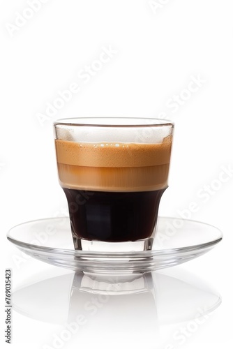 A cup filled with coffee resting on a saucer, showcasing the classic pairing of beverage and dish