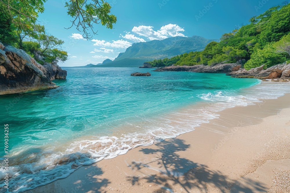 Pristine sandy beach with crystal-clear turquoise water, surrounded by lush greenery and mountainous terrain