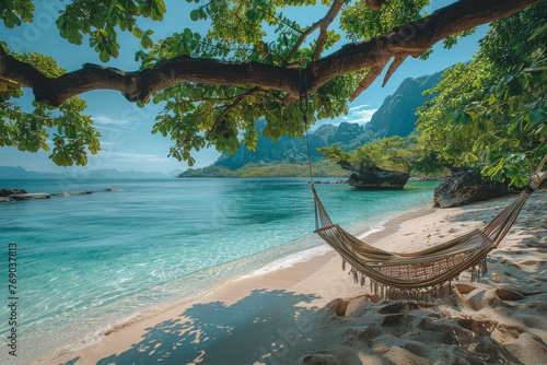 A hidden paradise with a hammock tied between trees overlooking a serene beach cove enclosed by greenery