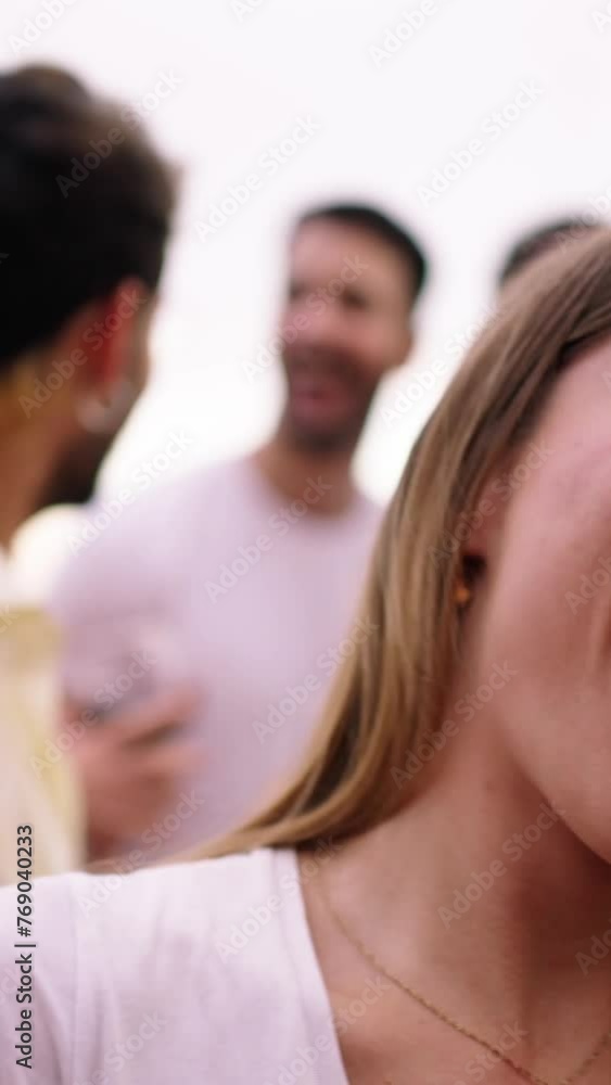 POV vertical video attractive Caucasian young woman looking coquettish at camera. Dancing and toasting with red wine glass. Group friends celebrating together at rooftop party. Young girl flirting POV vertical video attractive Caucasian young woman looking coquettish at camera. Dancing and toasting with red wine glass. Group friends celebrating together at rooftop party. Young girl flirting