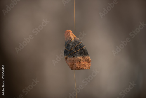 a pebble on a string